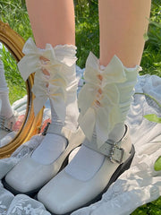 White & Yellow/Black & Pink Cutout Design Ruffled Trim Calf Socks with Bow Decorations
