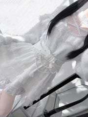 White Sweater with Criss-cross Neckline, Shoulder Cut-outs and Cross Embellishment