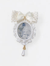 White Mirror-shaped Brooch with Blue Floral Pattern