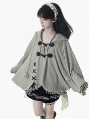 Mori Kei Dusty Green Hooded Cape with Pom-Pom Accents and Lace-Up Design