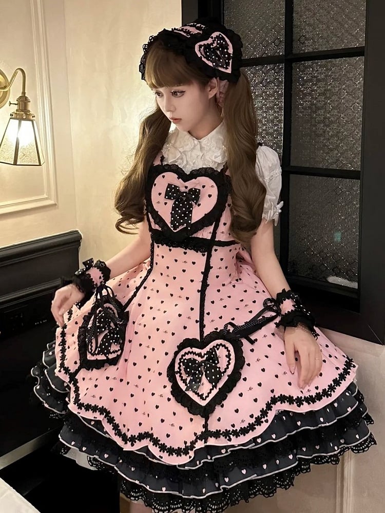 Pink Lace-Trimmed Sweet Lolita Dress with Black Heart Motifs and Bows