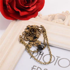 Steampunk Bow Rhinestone Detail Rose Brooch Red/ Black/ White